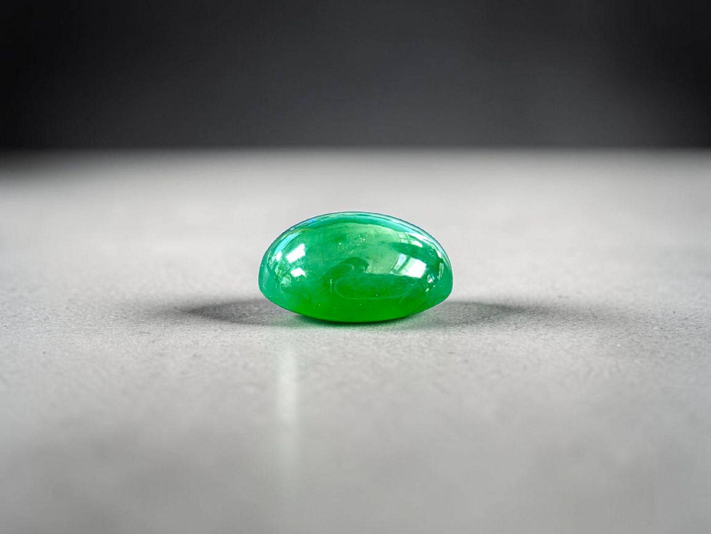 Certified MADE IN JAPAN 9.05 cts. Bright Apple Green Burmese A-Jadeite Oval Cabochon Loose Stone LS63