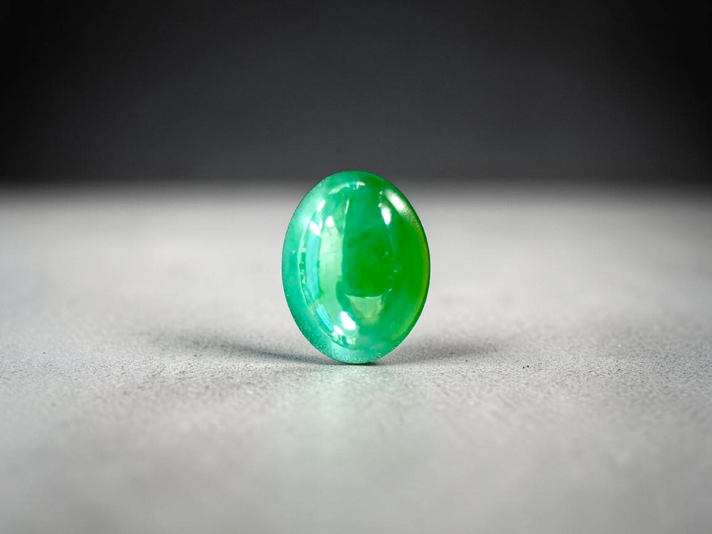 Certified MADE IN JAPAN 9.05 cts. Bright Apple Green Burmese A-Jadeite Oval Cabochon Loose Stone LS63
