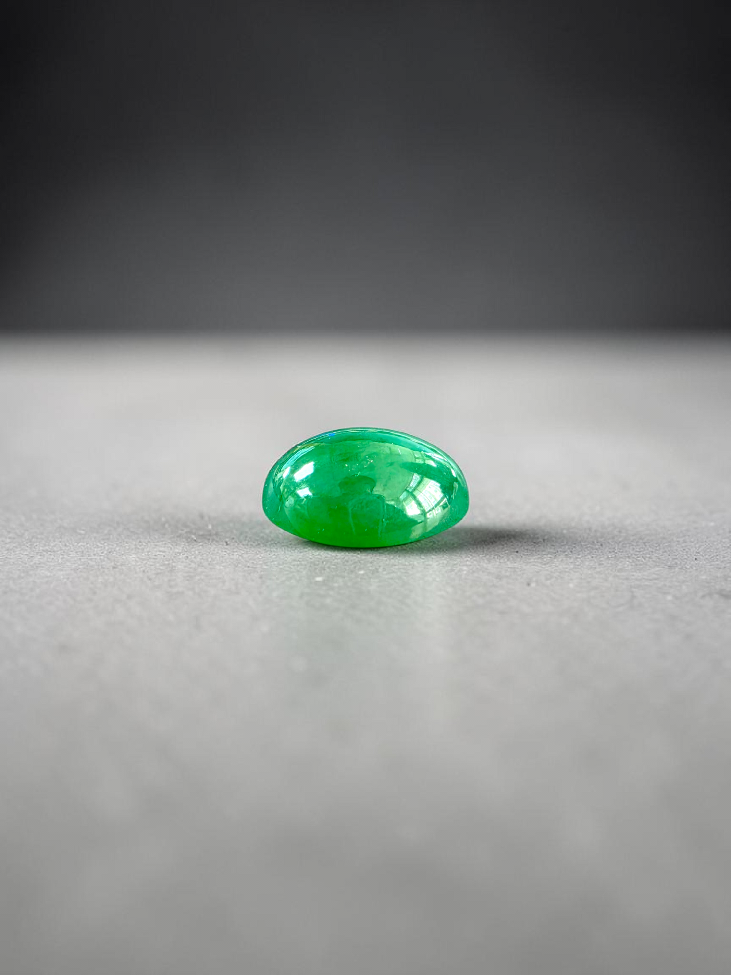 Certified MADE IN JAPAN 9.05 cts. Bright Apple Green Burmese A-Jadeite Oval Cabochon Loose Stone LS63