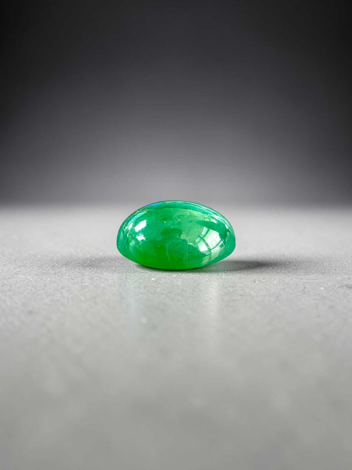 Certified MADE IN JAPAN 9.05 cts. Bright Apple Green Burmese A-Jadeite Oval Cabochon Loose Stone LS63