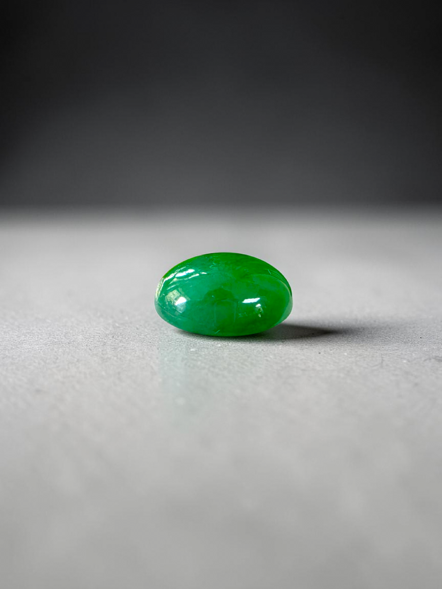 Certified MADE IN JAPAN 9.05 cts. Bright Apple Green Burmese A-Jadeite Oval Cabochon Loose Stone LS63