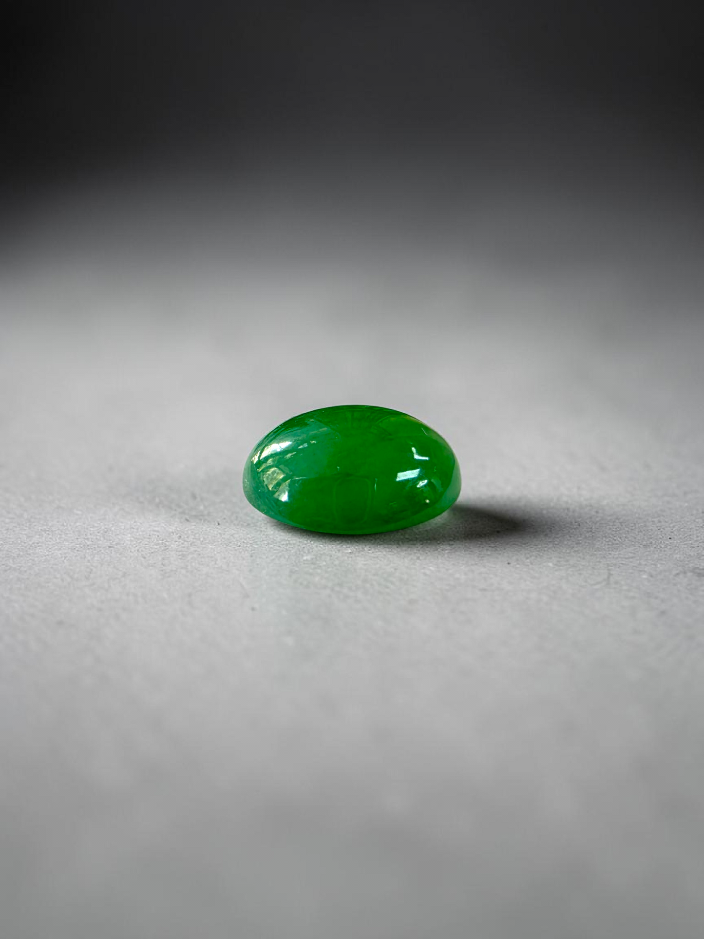 Certified MADE IN JAPAN 9.05 cts. Bright Apple Green Burmese A-Jadeite Oval Cabochon Loose Stone LS63