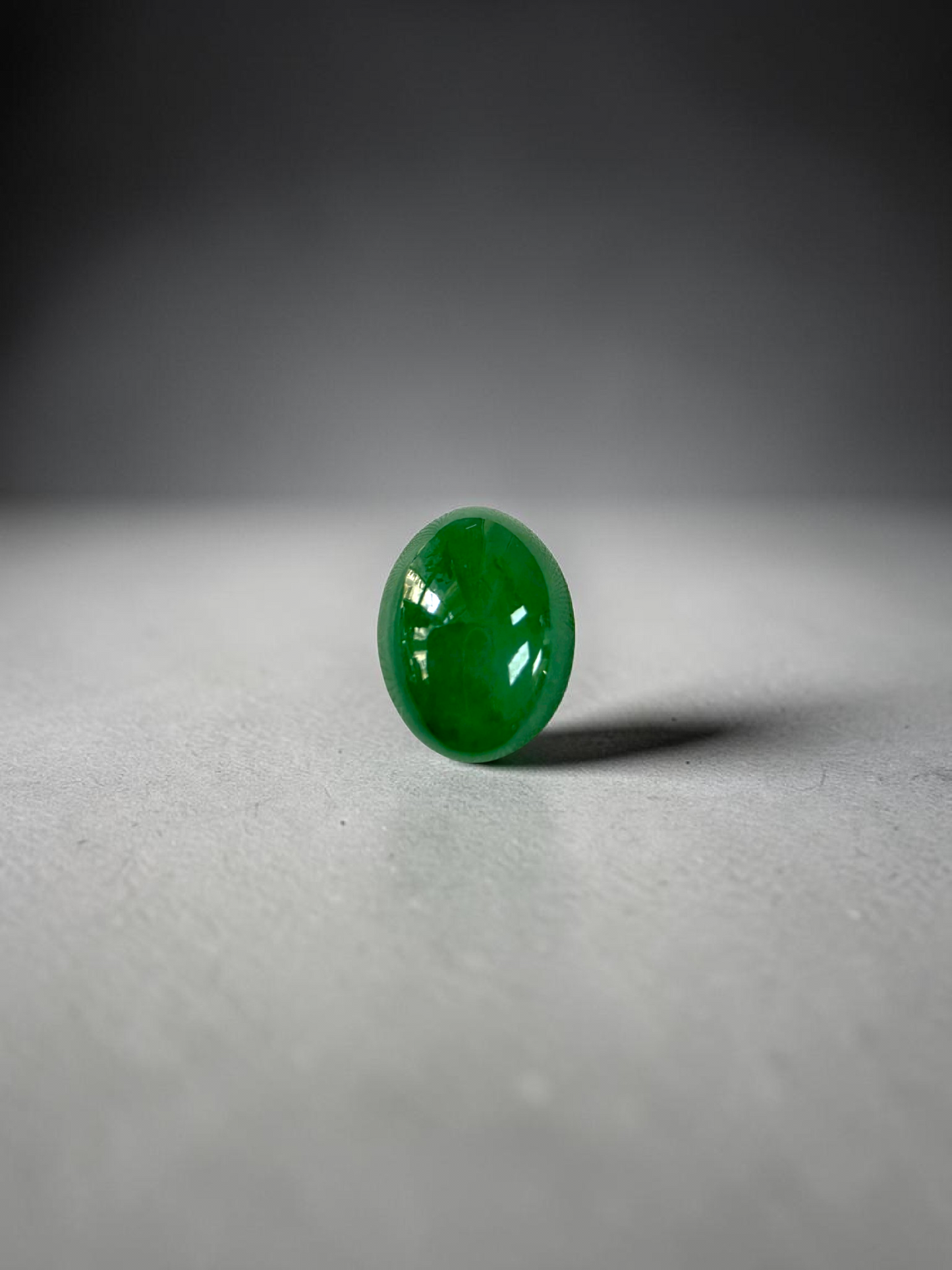 Certified MADE IN JAPAN 9.05 cts. Bright Apple Green Burmese A-Jadeite Oval Cabochon Loose Stone LS63