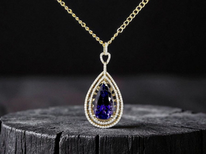 Rho (10.35 cts.) Tanzanite and Natural Diamonds Pendant (with 14K Yellow Gold)- JPA2553